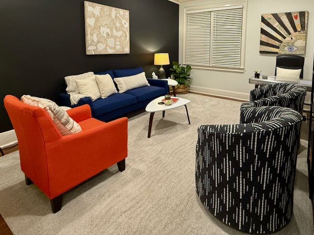 Warm and inviting therapy office at DK Counseling in Alpharetta with comfortable seating and natural light